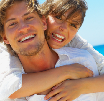 Happy couple with perfect teeth from advanced dental technology with a Billings MT dentist