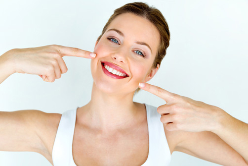 Smiling woman happy about laser dentistry in Billings, MT