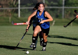A young woman playing outdoor sports, a common cause of dental emergencies in Billings.